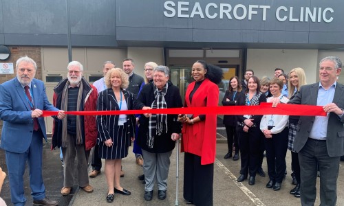 Pat Oxley, first patient at Seacroft Clinic cutting the ribbon at the reopening of the clinic alongside Councillor Abigail Katung, Councillor David Jenkins and Leeds Community Healthcare’s Sam Prince, Executive Director of Operations and Bryan Machin, Exe